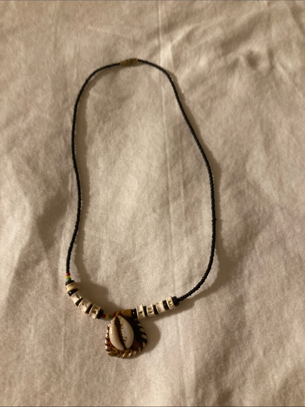 Tribal Beaded Necklace with Cowrie Shell Pendant